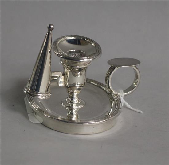 An Edwardian silver chamberstick, James Parkes, London, 1905, 82mm.